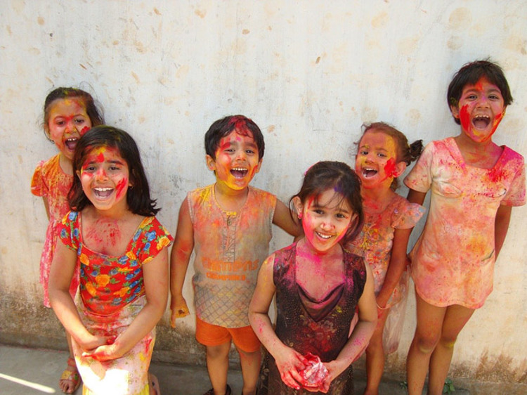 Children celebrating Holi festival of colour, India